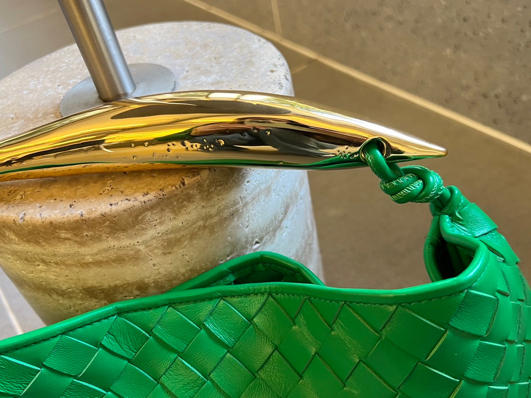 SARDINA 33 CON CADENA EN PIEL DE CORDERO VERDE TRÉBOL