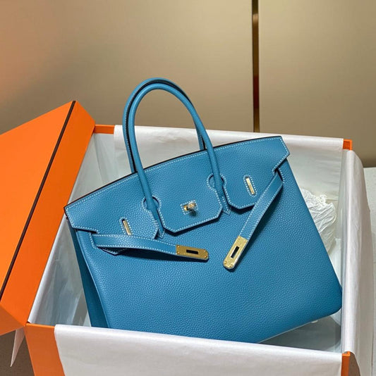 BOLSO HM BIRKIN DE 35 CM CON HERRAMIENTAS EN ORO CERULEAN TOGO