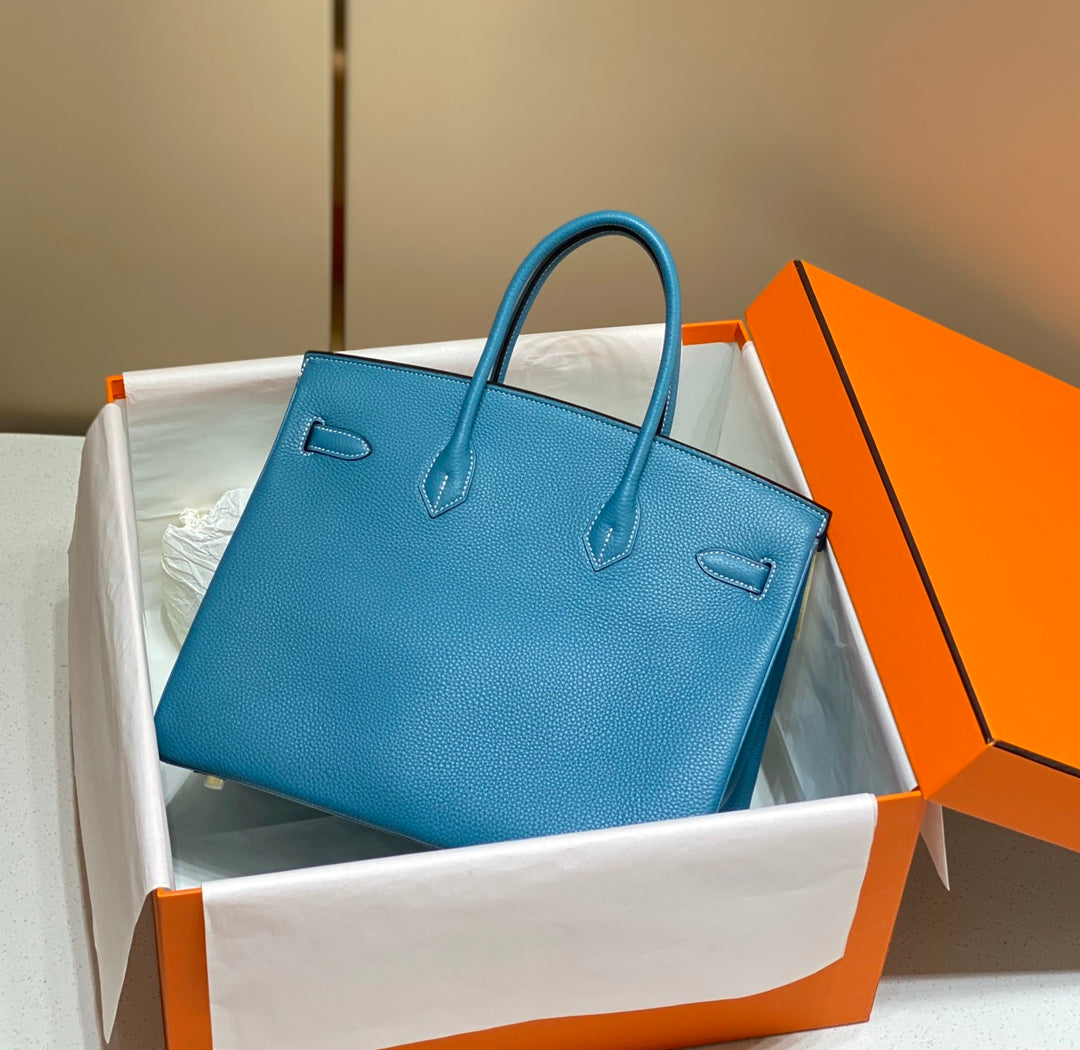 BOLSO HM BIRKIN DE 35 CM CON HERRAMIENTAS EN ORO CERULEAN TOGO