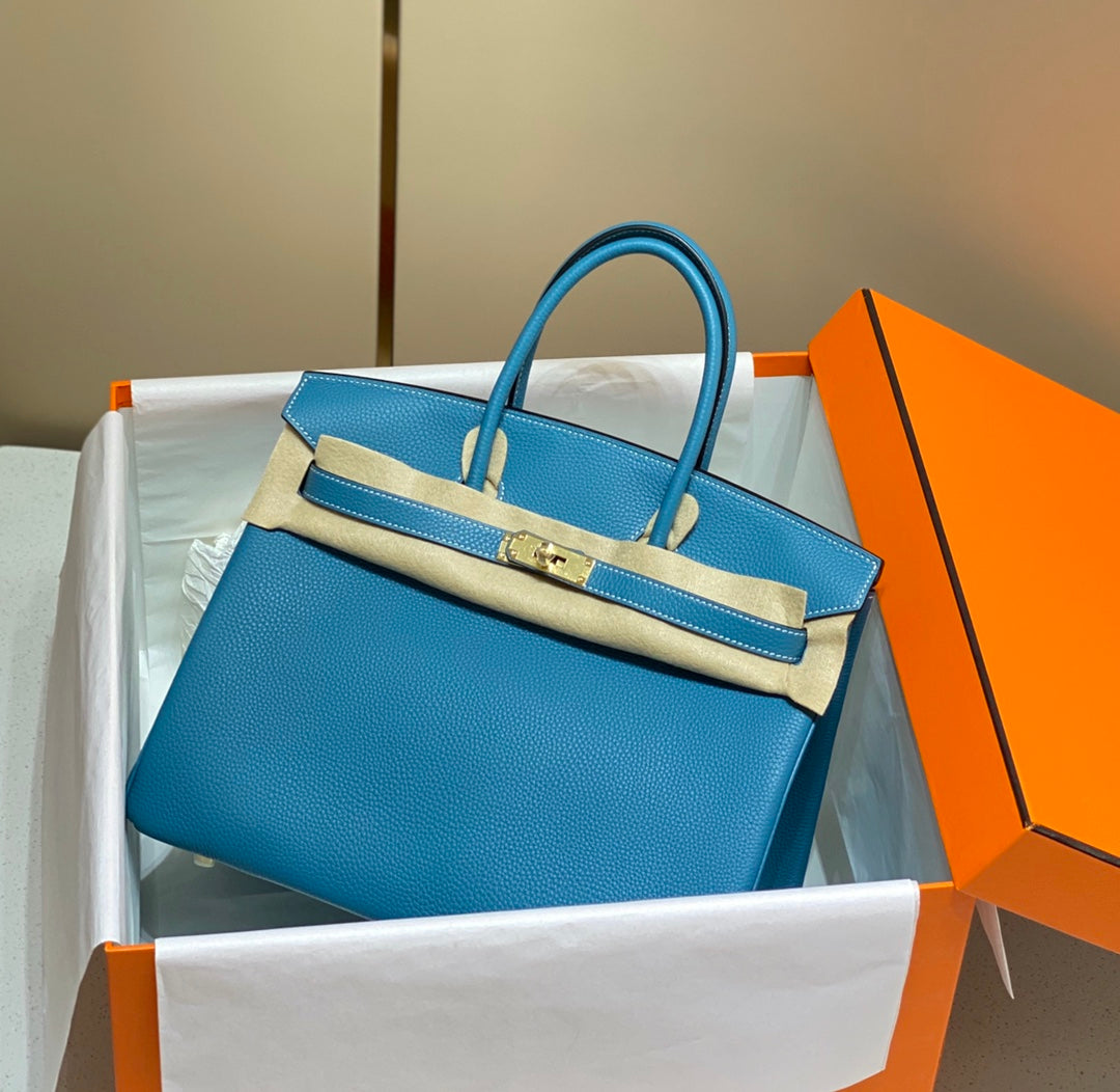 BOLSO HM BIRKIN DE 35 CM CON HERRAMIENTAS EN ORO CERULEAN TOGO