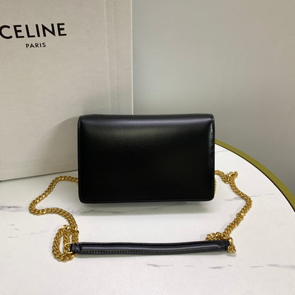 CARTERA CON CADENA MARGO 19 EN PIEL DE BECERRO LISA NEGRA CON HERRAJES DORADOS