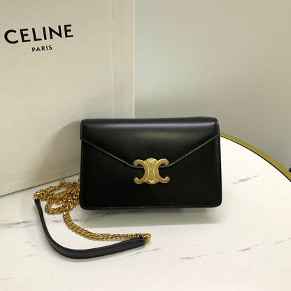 CARTERA CON CADENA MARGO 19 EN PIEL DE BECERRO LISA NEGRA CON HERRAJES DORADOS