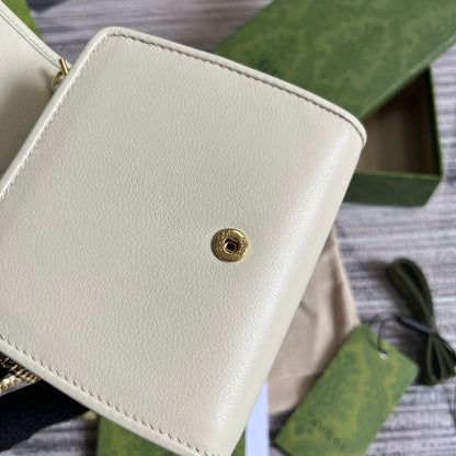 BOLSO DE HOMBRO MINI BLONDIE INTERLOCK DE 12" EN PIEL DE BECERRO BLANCA Y CADENA DORADA