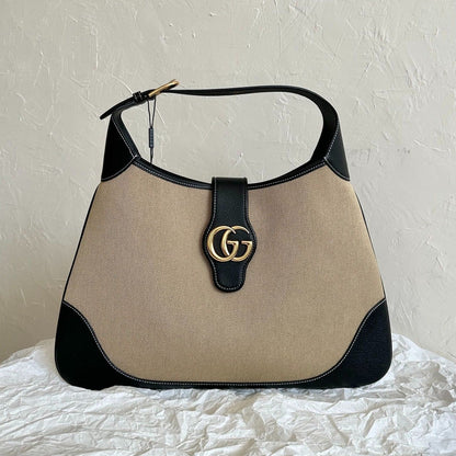 BOLSO GRANDE AFRODITA 47 DE LONA BEIGE Y PIEL DE BECERRO NEGRA