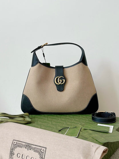 BOLSO GRANDE AFRODITA 47 DE LONA BEIGE Y PIEL DE BECERRO NEGRA
