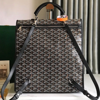 MOCHILA SAINT LÉGER 35 EN LONA GOYARDINE MIXTA MARRÓN Y NEGRO Y PIEL DE BECERRO CON PARCHE DE DIBUJOS ANIMADOS