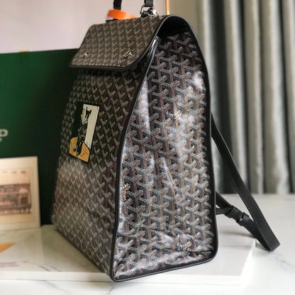 MOCHILA SAINT LÉGER 35 EN LONA GOYARDINE MIXTA MARRÓN Y NEGRO Y PIEL DE BECERRO CON PARCHE DE DIBUJOS ANIMADOS