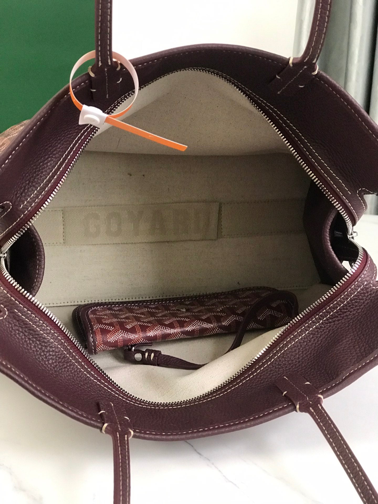 BOLSO HARDY PM 40 EN LONA GOYARDINE MARRÓN Y ADORNO DE CUERO TAURILLON