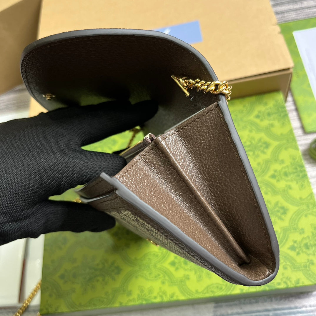 BOLSO DE HOMBRO BLONDIE 21 EN LONA BEIGE CON MONOGRAMA Y RIBETE DE PIEL DE BECERRO MARRÓN OSCURO CON HERRAJES DORADOS