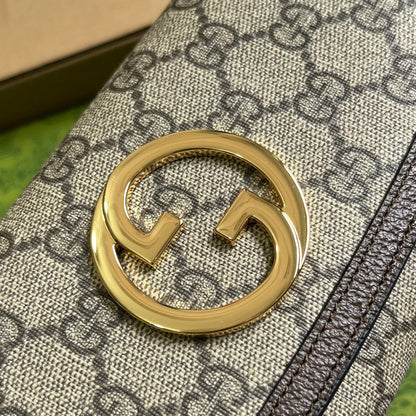 BOLSO DE HOMBRO BLONDIE 21 EN LONA BEIGE CON MONOGRAMA Y RIBETE DE PIEL DE BECERRO MARRÓN OSCURO CON HERRAJES DORADOS