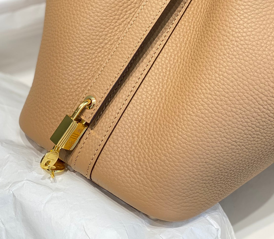 cerradura picotina 18 beige togo ghw
