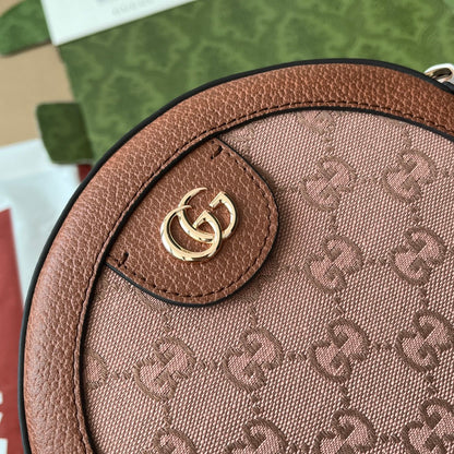 BOLSO DE HOMBRO OPHIDIA MINI REDONDO DE 18" EN LONA ROSA RUBORIZADO Y ADORNO DE CUERO MARRÓN