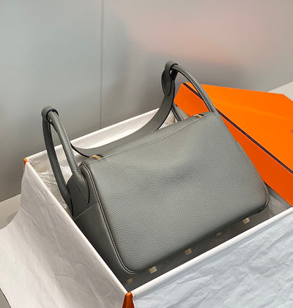BOLSO HM LINDY 30 PIEL TAURILLON CLEMENCE GRIS