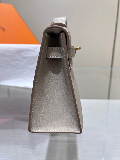 BOLSO DE POCHETTE HM KELLY 22 CM GRIS SWIFT CON HERRAJES DORADOS