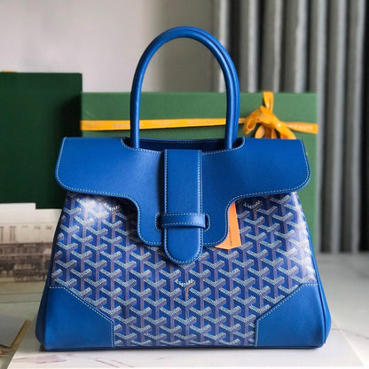 BOLSO SAIGON SOUPLE 34 EN LONA GOYARDINE AZUL CURIOSAMENTE Y PIEL DE BECERRO