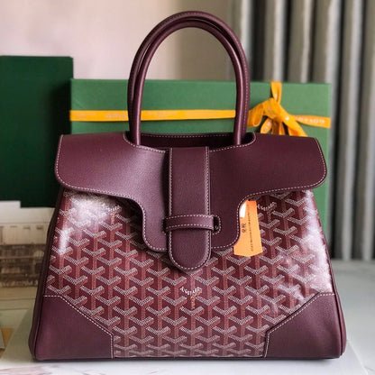 BOLSO SAIGON SOUPLE 34 EN LONA GOYARDINE ROJO BURDEOS Y PIEL DE BECERRO