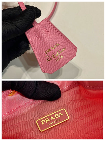SAC SEAU 19 EN RE-NYLON ROSE BONBON ET POIGNÉE EN CUIR SAFFIANO