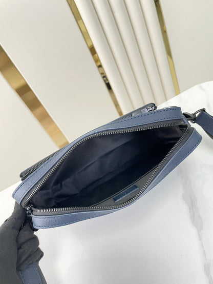 TRIO MESSENGER 25 EN PIEL DE BECERRO SOMBRA MONOGRAMA AZUL PRUSIA