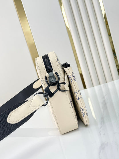 TRIO MESSENGER 25 EN PIEL DE BECERRO SOMBRA MONOGRAMA AZUL CREMA