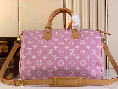 SPEEDY P9 BANDOULI¨¨RE 40 IN FLAMINGO PINK MONOGRAM CALFSKIN