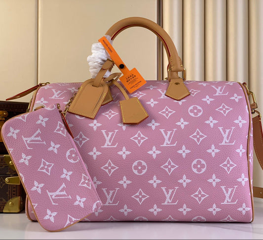 SPEEDY P9 BANDOULI¨¨RE 40 IN FLAMINGO PINK MONOGRAM CALFSKIN