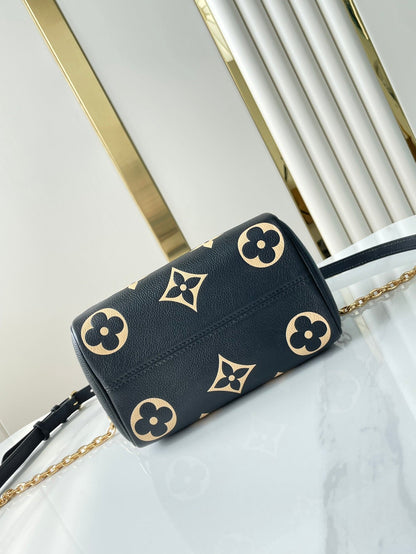 SPEEDY BANDOULI¨¨RE 20 EN CUERO NEGRO CREMA CON MONOGRAMA IMPRESO Y HERRAJES DORADOS