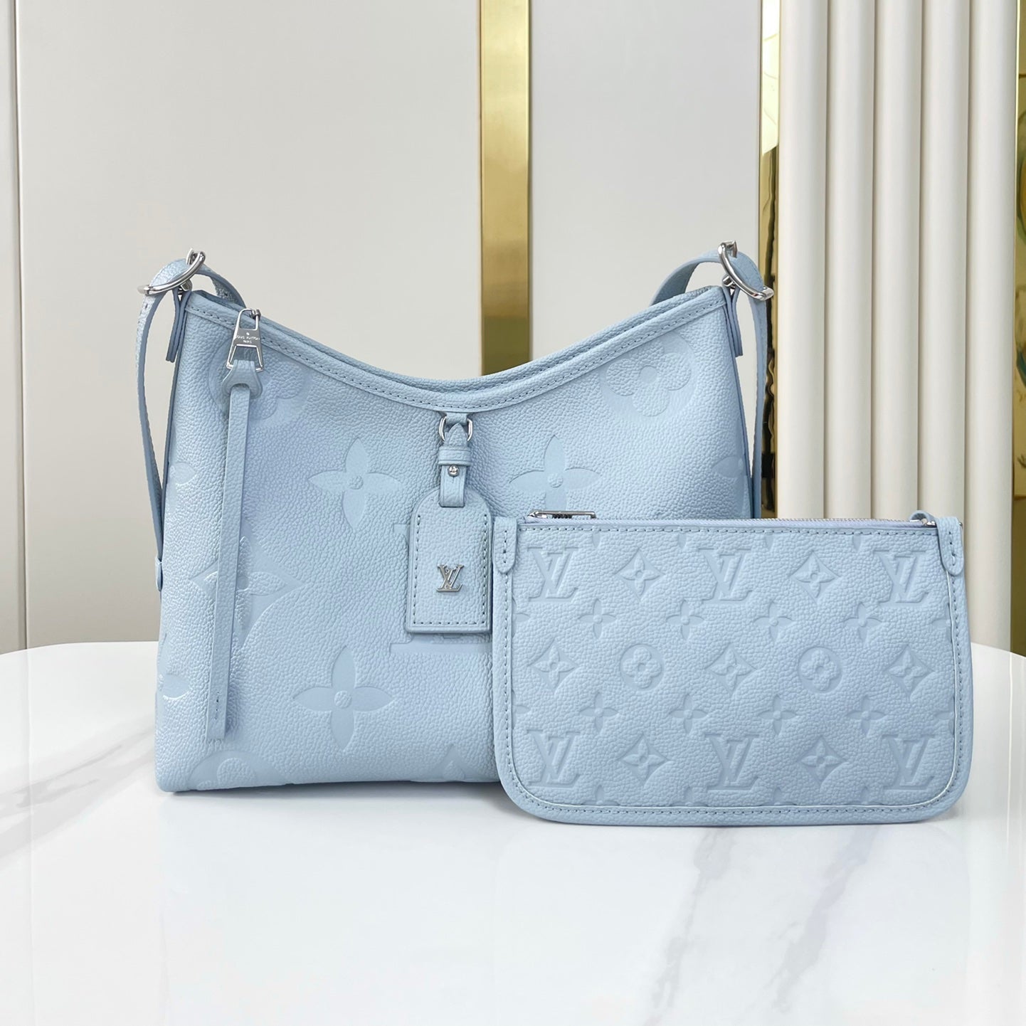 CARRYALL PM 29 DE PIEL EMPREINTE MONOGRAMA AZUL HERMOSO
