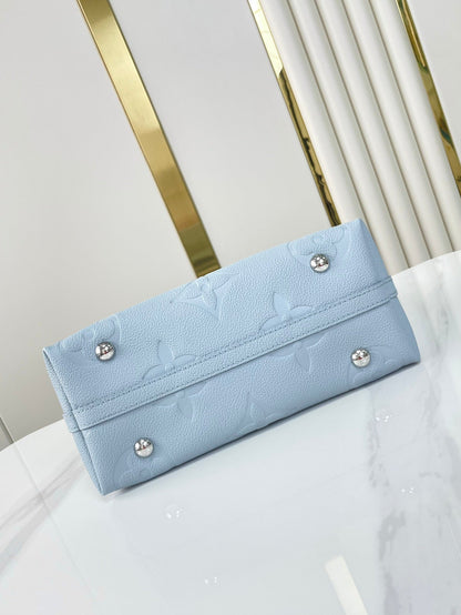 CARRYALL PM 29 DE PIEL EMPREINTE MONOGRAMA AZUL HERMOSO