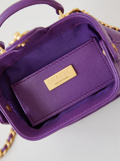 CC 24A Mini bolso de mano con asa superior, 13 cm, piel encerada morada, herrajes dorados 238457