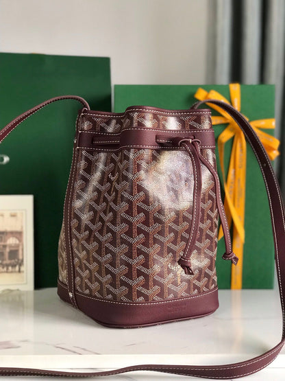 BOLSO CUBO PETIT FLOT 22 EN LONA GOYARDINE ROJO VINO Y RIBETE DE PIEL DE CORDERO