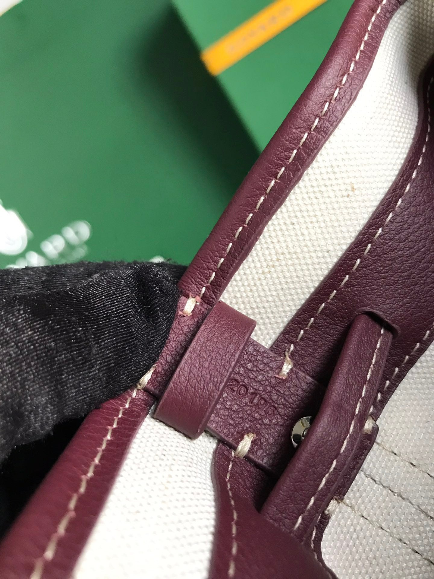 BOLSO CUBO PETIT FLOT 22 EN LONA GOYARDINE ROJO VINO Y RIBETE DE PIEL DE CORDERO