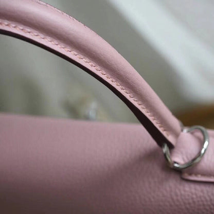 HM KELLY 28 CM ROSA TOGO HERRAJES DE PLATA