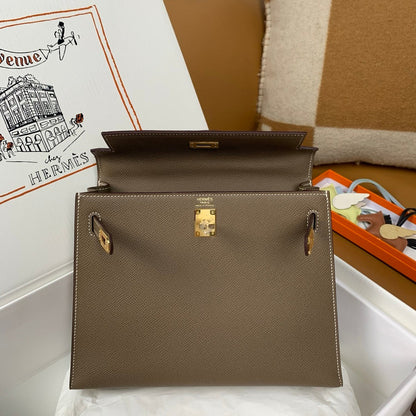 HM KELLY 28 CM ESTUCHE EPSOM HARDWARE DORADO