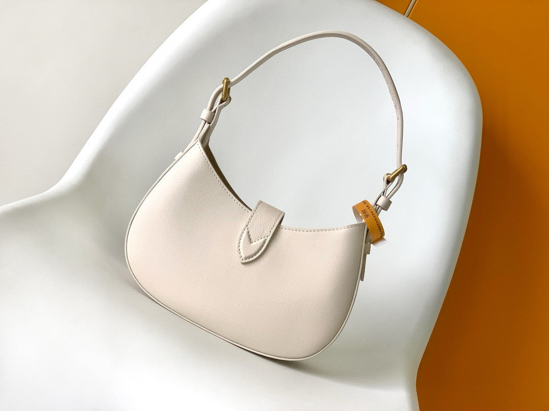 Bolso de hombro discreto de 26 cm en piel de becerro color crema 
