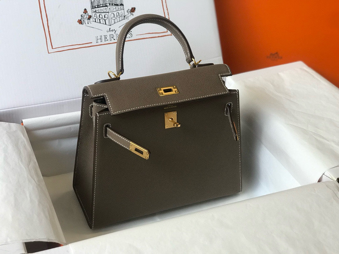 HM KELLY 25 ETOUPE EPSOM CUERO HIERROS DORADOS
