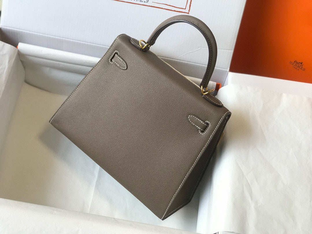 HM KELLY 25 ETOUPE EPSOM CUERO HIERROS DORADOS