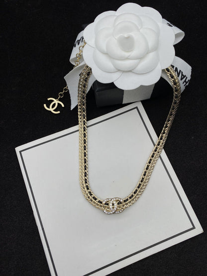 COLLIER FIL NOIR DOUBLE C OR DIAMANT