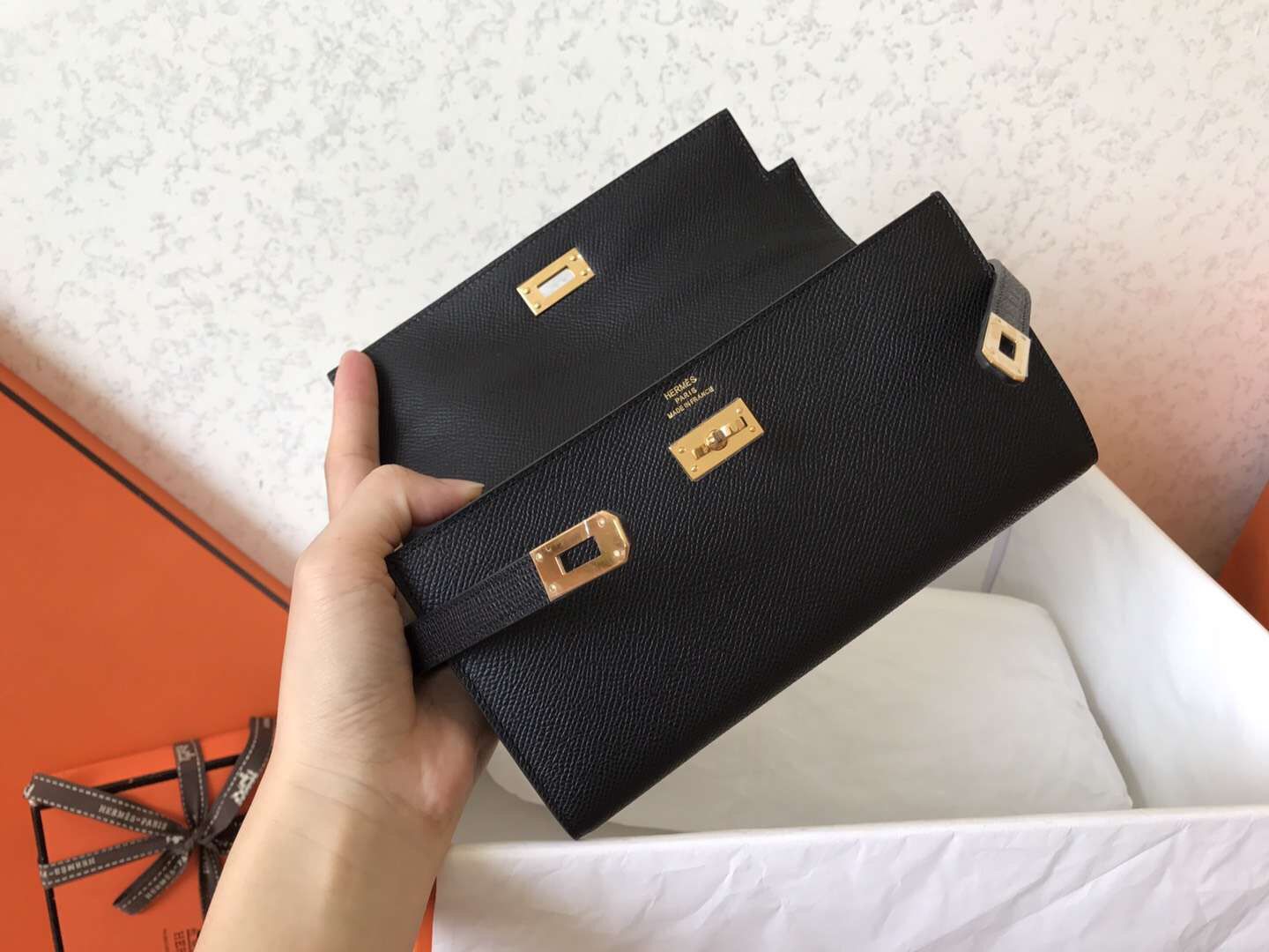 Cartera larga Kelly de 20 cm de piel Epsom negra