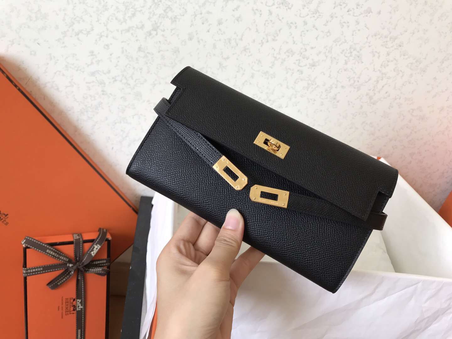 Cartera larga Kelly de 20 cm de piel Epsom negra