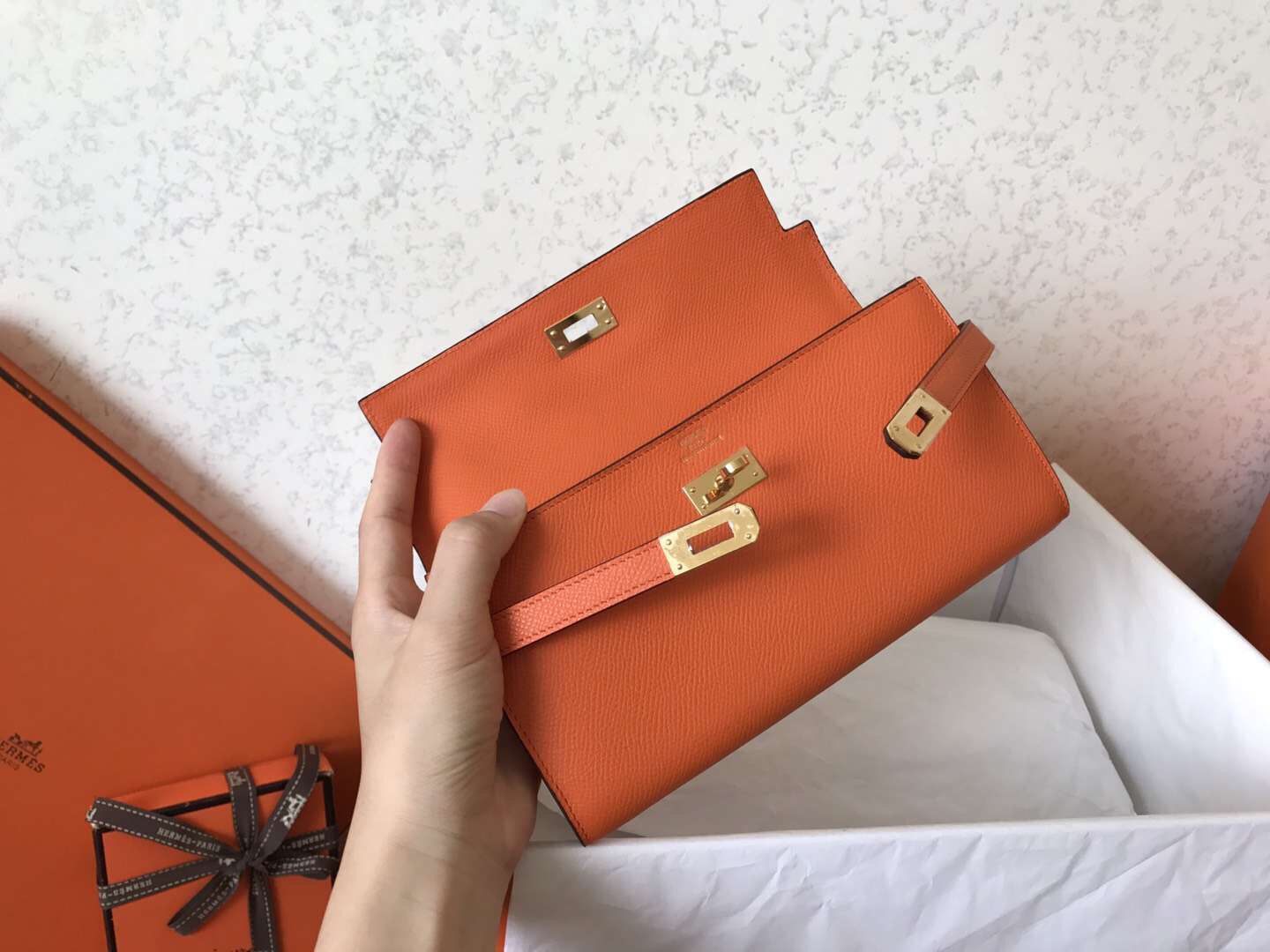 Cartera larga Kelly de 20 cm de piel Epsom naranja