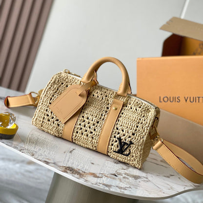 KEEPALL BANDOULI¨¨RE 25 EN RAFIA DE GANCHILLO BEIGE Y RIBETE DE PIEL DE BECERRO