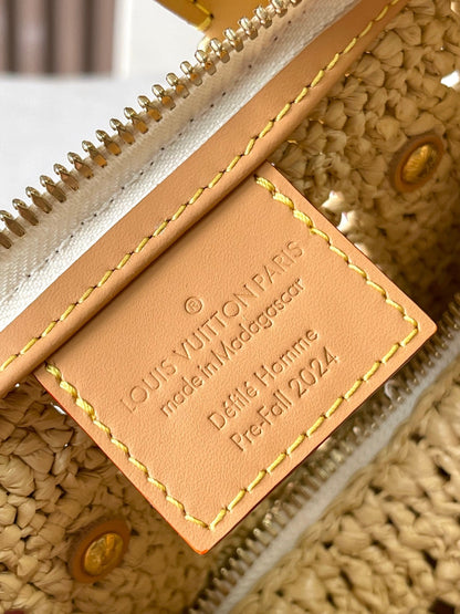 KEEPALL BANDOULI¨¨RE 25 EN RAFIA DE GANCHILLO BEIGE Y RIBETE DE PIEL DE BECERRO