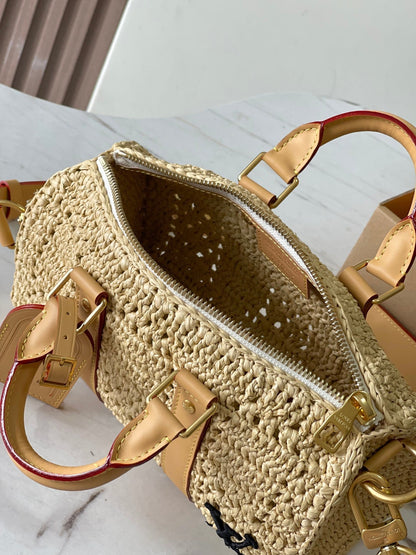 KEEPALL BANDOULI¨¨RE 25 EN RAFIA DE GANCHILLO BEIGE Y RIBETE DE PIEL DE BECERRO