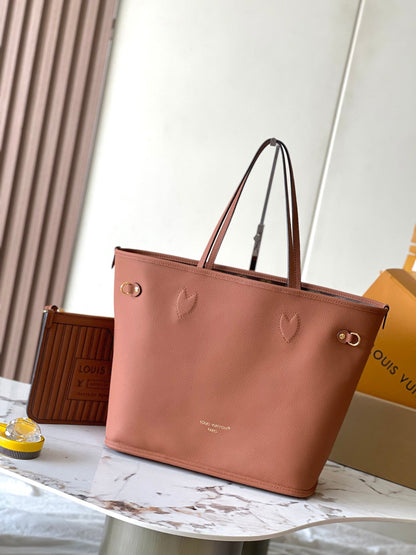 NEVERFULL INSIDE OUT MM 31 EN LONA MARRÓN CON MONOGRAMA Y RIBETE DE PIEL DE BECERRO