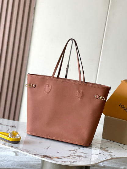 NEVERFULL INSIDE OUT MM 31 EN LONA MARRÓN CON MONOGRAMA Y RIBETE DE PIEL DE BECERRO