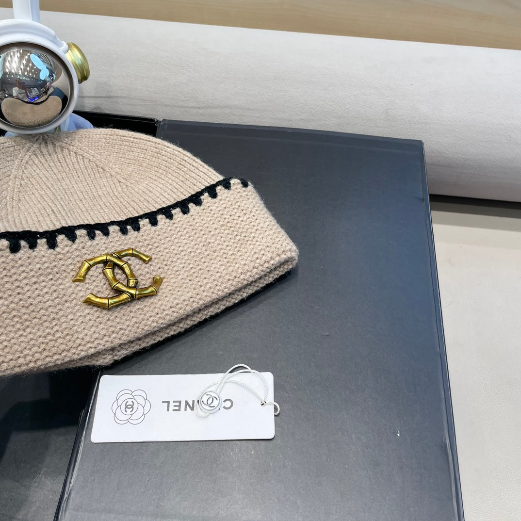 GORRO DE PUNTO EN LANA BEIGE CAMEL 424300 