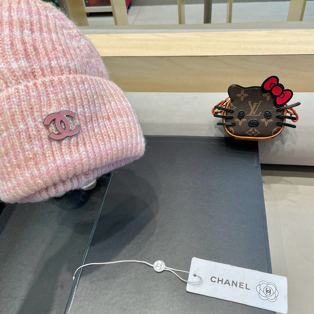 GORRO DE PUNTO A RAYAS EN LANA ROSA CLARO 424515 