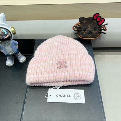GORRO DE PUNTO A RAYAS EN LANA ROSA CLARO 424515 