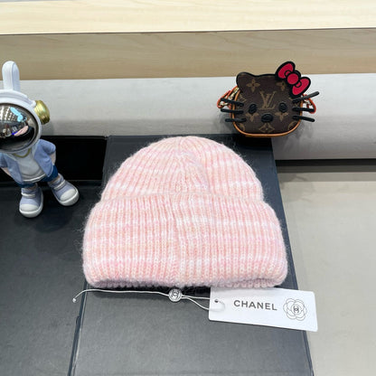 GORRO DE PUNTO A RAYAS EN LANA ROSA CLARO 424515 