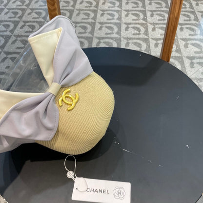SOMBRERO DE PESCADOR CON LAZO EN RAFIA BEIGE MEZCLA MORADA PÁLIDA 426169 